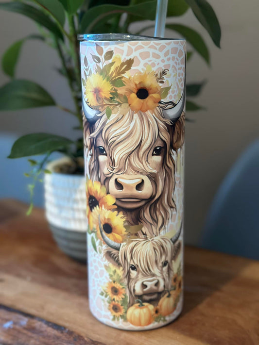 Vâches et tournesols